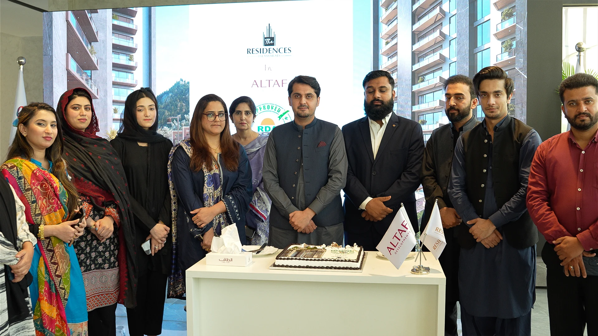 Altaf Developments team celebrating a project milestone
